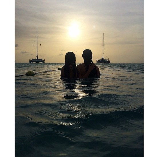 My babies in the ocean where our hotel walks out too (past the pool).  Jen (16) and Kelly (17). <3